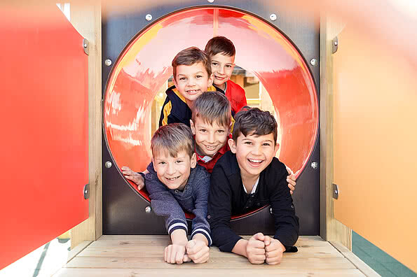 Children playing in the playground in the family hotel Sonnen Resort in South Tyrol