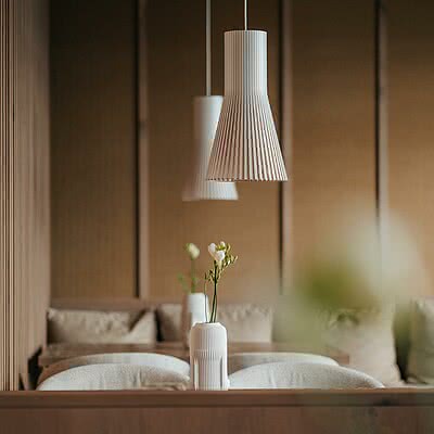 Zeitloses mediterranes Design. Warme Farbtöne, edle Materialien und ausgewählte Details prägen das Interior im Sonnen Resort.